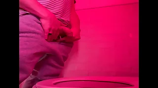 Amateur guy pissing in the toilets of a bar